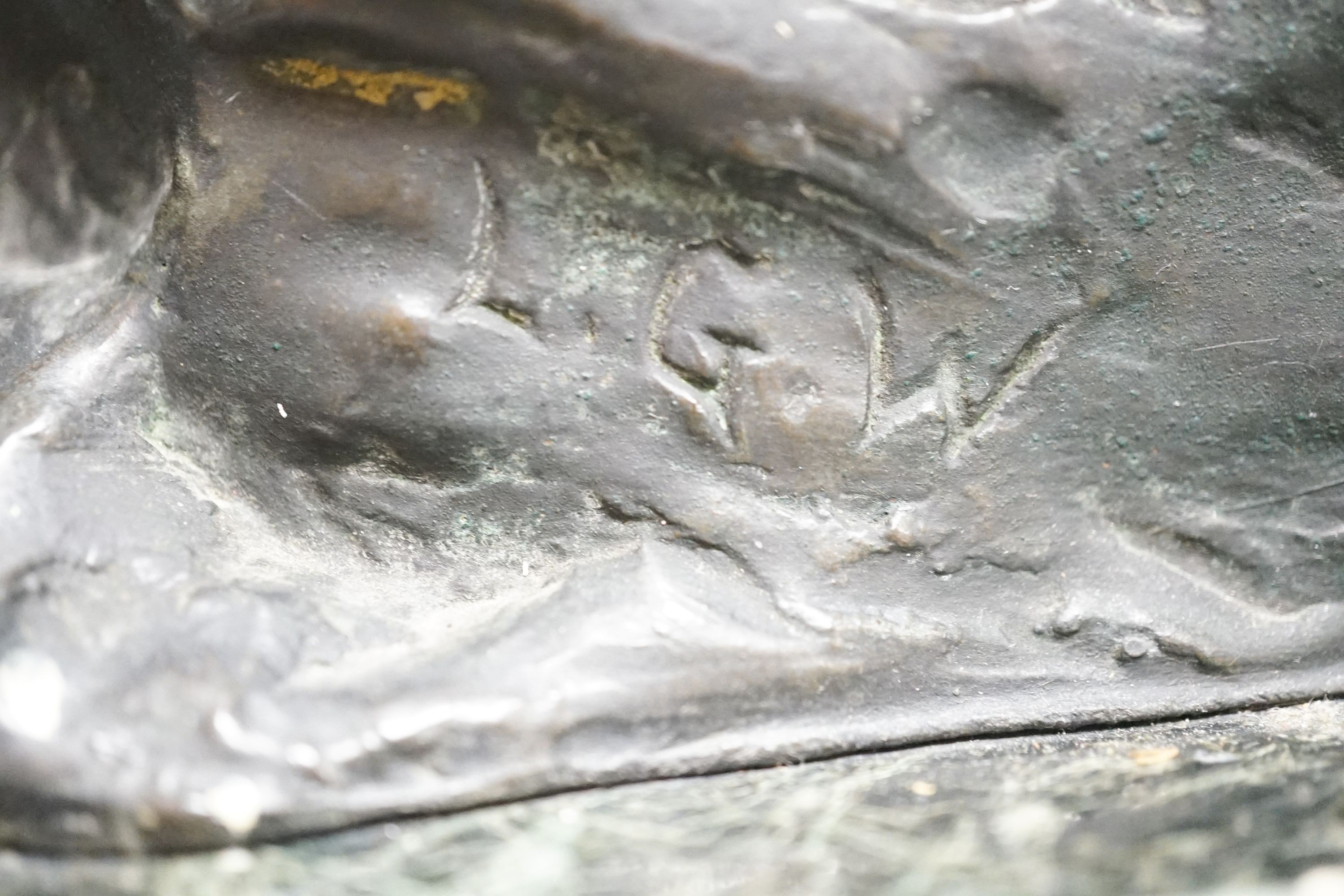 Lucy Gwendolen Williams (1870-1955). A bronze figure of a seated youth, green marble plinth, 24cm high